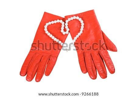 Red gloves and heart on a white background (isolated)
