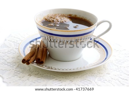 coffee with cinnamon powder and bark