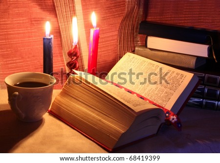 reading books and burning candles