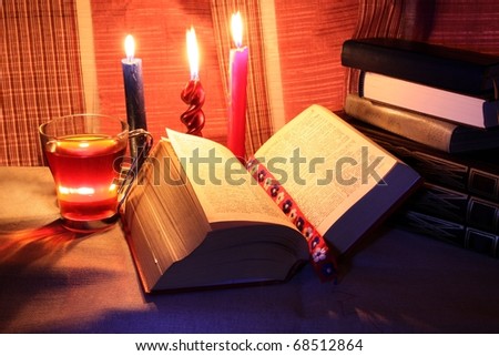 reading books and burning candles