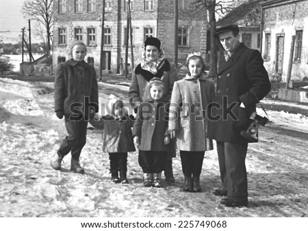 JASLO,POLAND - CIRCA 1954 : vintage photo of parents with their chidren