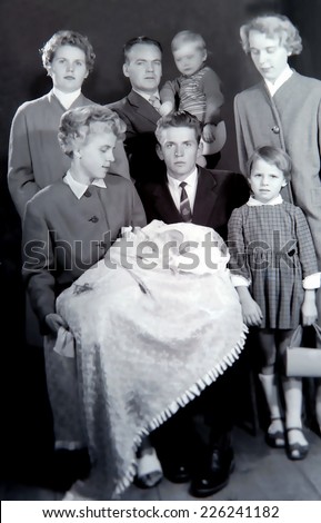 JASLO,POLAND - CIRCA 1958 : vintage photo of family with baby christening