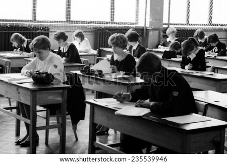 JASLO,POLAND - CIRCA 1968 :vintage photo of girls writting their examination for the secondary school certificate