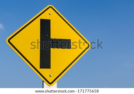 Crossroads sign on blue sky