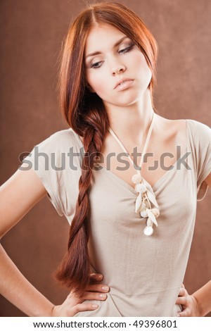 stock-photo-young-pretty-girl-with-long-red-hair-49396801.jpg