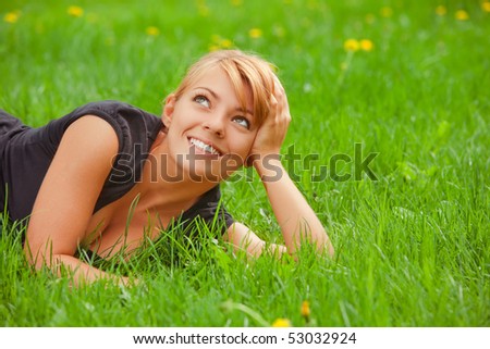 pretty girls with brown hair and green. pretty girl lying on green