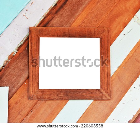vintage wooden frame on wooden wall