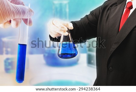 business man research chemistry at science lab , pharmaceutical concept background