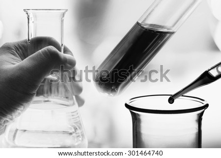 black and white chemistry test at science lab background