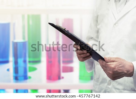scientist research chemistry vaccine at science lab , pharmaceutical product