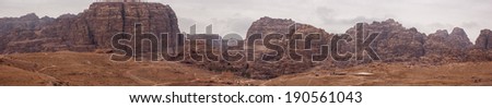 A Panorama  Panoramic View of The City of Petra and The Beautiful Mountains with Winter Sky. Jordan Tourism.