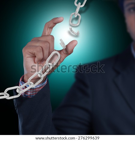 Business man with broken chain