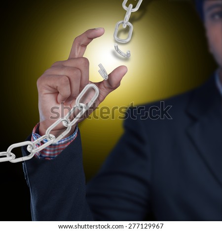 Business man with broken chain