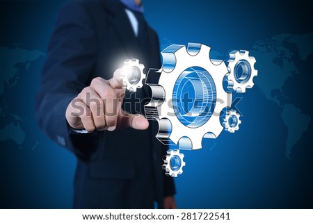 businessman showing gears cogs to success concept
