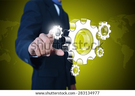 businessman showing gears cogs to success concept