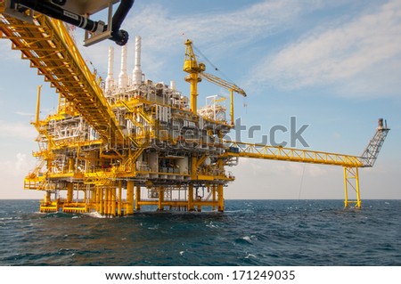 Oil And Gas Platform In The Gulf Or The Sea, The World Energy, Offshore Oil And Rig Construction.Platform For Production Oil And Gas.