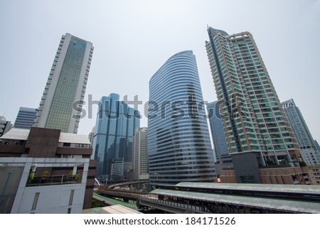 The modern buildings of the city skyscrapers, tall building, business tower at downtown, City center, business area between evening to twilight night, Bangkok, capital city of Thailand