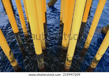 Oil and Gas Producing Slots at Offshore Platform - Oil and Gas Industry, Production pipe line from well head platform to Production plant.