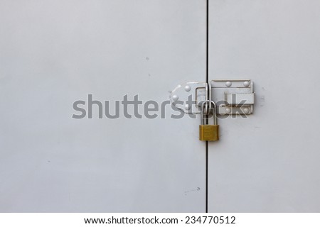 Background of door with lock in metal material, Security equipment.