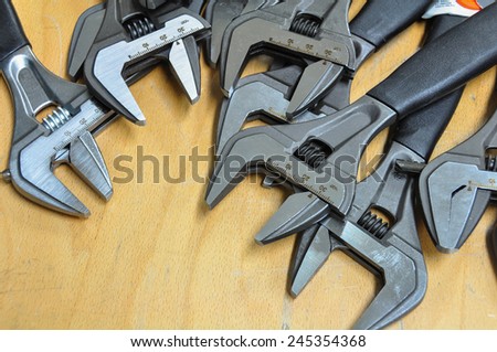 set of hand tools on a wooden background, Wrench tools or Pipe wrench for hard work.