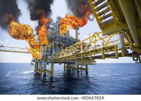 offshore oil and gas fire case or emergency case in warm picture style, firefighter operation to control fire on oil and gas production platform, offshore worst case and can\'t control fire