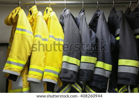 firefighter suit and equipment ready for operation, Fire fighter room for store equipment, Protection equipment of fire fighter.