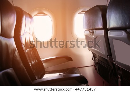 Lonely travel by airplane to somewhere, Journey for business by airplane and see out of airplane window, Sky view of Airplane from high level, Airplane interior for first class level and support VIP.