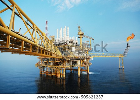 Offshore construction platform for production oil and gas. Oil and gas industry and hard work. Production platform and operation process by manual and auto function.oil and rig industry and operation.