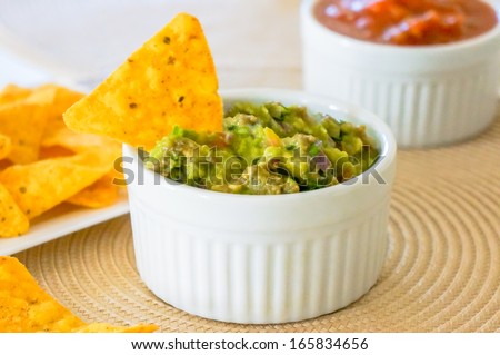 Mexican nachos. Homemade mexican salsas with corn chips