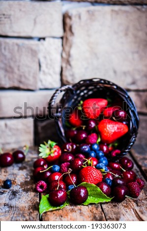 Berries mix on rustic background