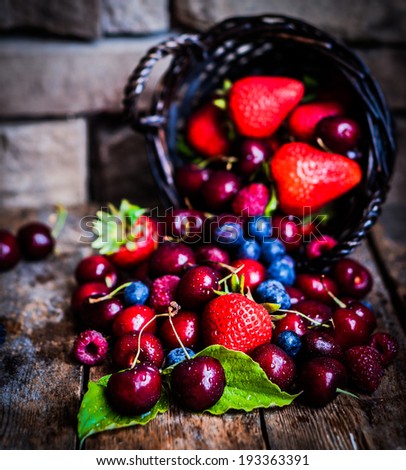 Berries mix on rustic background