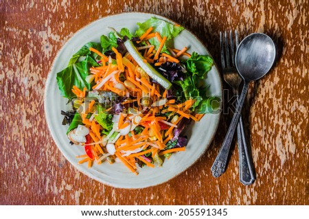 Healthy salad with carrot,almond and cheese