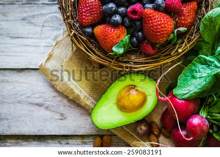 Fruits and vegetables on rustic background