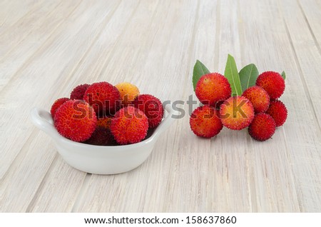 Ripe  Waxberry (Red Bayberry) in bowl of white porcelain in table