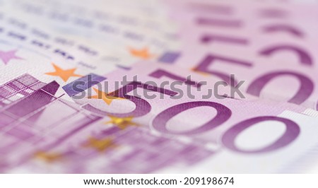Close up from stack of money with 500 euro banknotes. Perfect for illustrating e.g. wealth, lottery prizes or banking crises. What is your dream