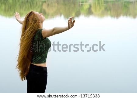 Freedom - girl with long hair imagining flying