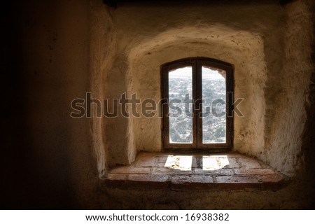 Old window from interior of a medieval castle
