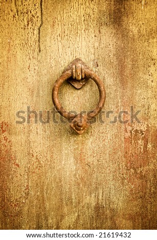 Vintage grungy image of ancient door knocker