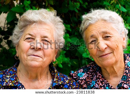 stock photo Outdoor portrait of two old ladies