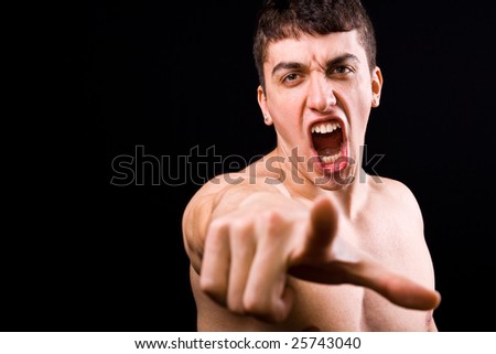 stock photo Loud scream of angry furious violent man pointing towards 