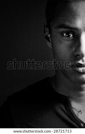 Half face of sensual masculine black man