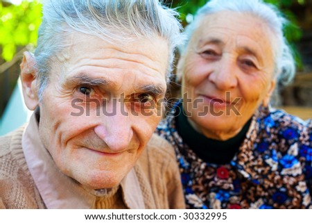 Old couple - two happy smiling seniors