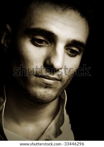 Sad melancholic young man in vintage style