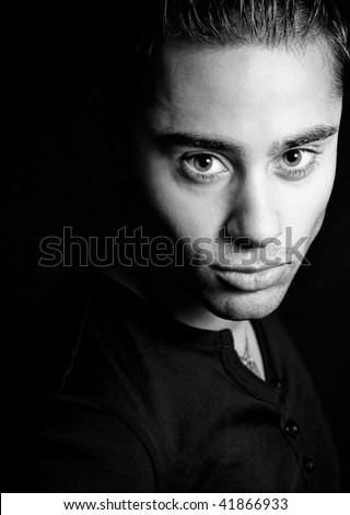 Black and white portrait of young handsome man