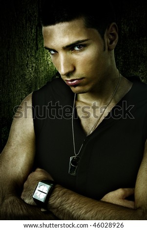 Grunge portrait of tough cool sexy young man