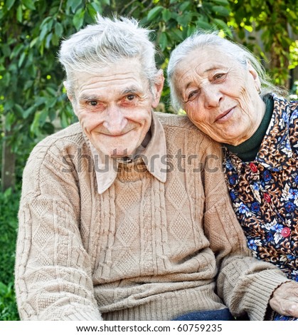 Happy and joyful old senior couple outdoor