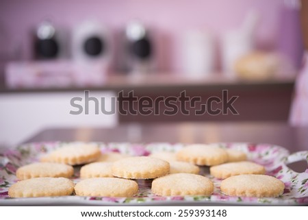 Oatmeal Cookies - A set of fresh, homemade oatmeal cookies on a wooden tray