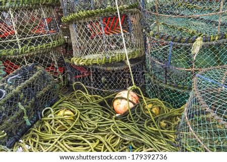 Trawler fishing nets, ropes and equipment set out on Mudeford Quay, Christchurch, Dorset, England, United Kingdom.