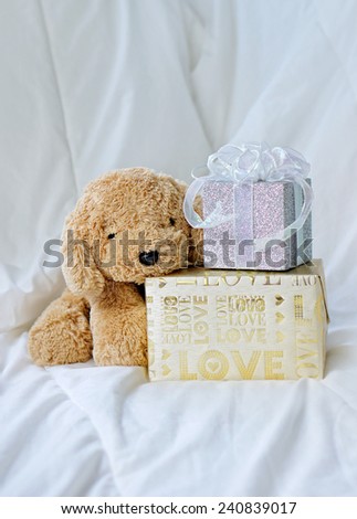 Cute doll with gift boxes