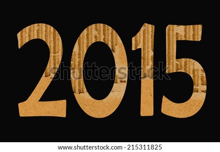 New Year 2015 of brown corrugated cardboard on black background . Texture of the brown corrugated cardboard in shape of number 2015. design element for new year\'s day, christmas, new year\'s eve